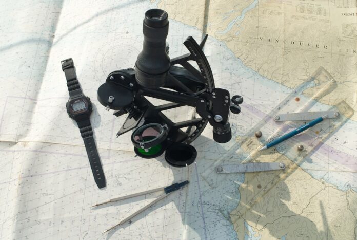 nautical-chart-with-navigation-tools-representing-a-full-tim Nautical chart with navigation tools representing a full-time sailing plan